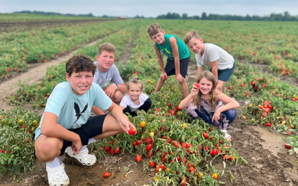 Growers for Red Gold tomatoes Miller Farms Galveston Indiana Drew and Taylor on front porch