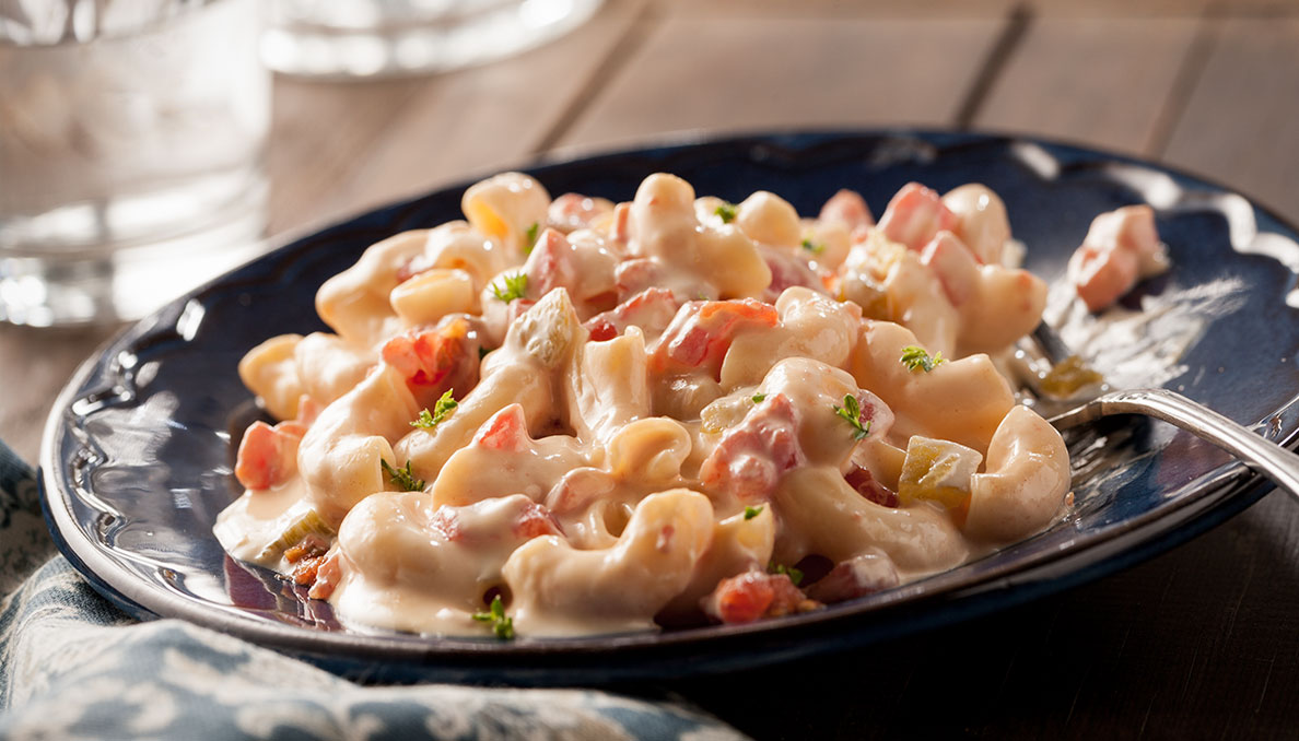 Image of Slow Cooker Macaroni and Cheese on blue plate